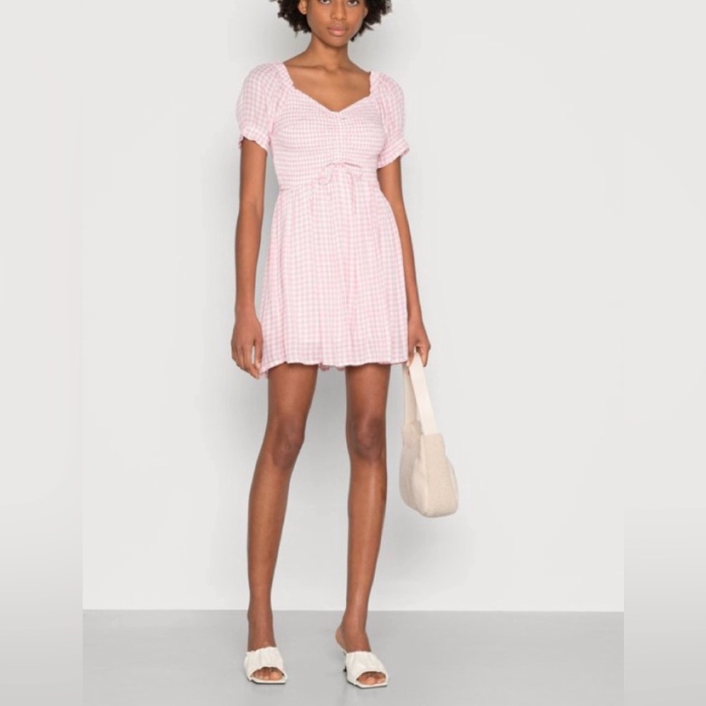 Pink Checkered Dress/Romper. Worn a few times. Size: XS in women’s